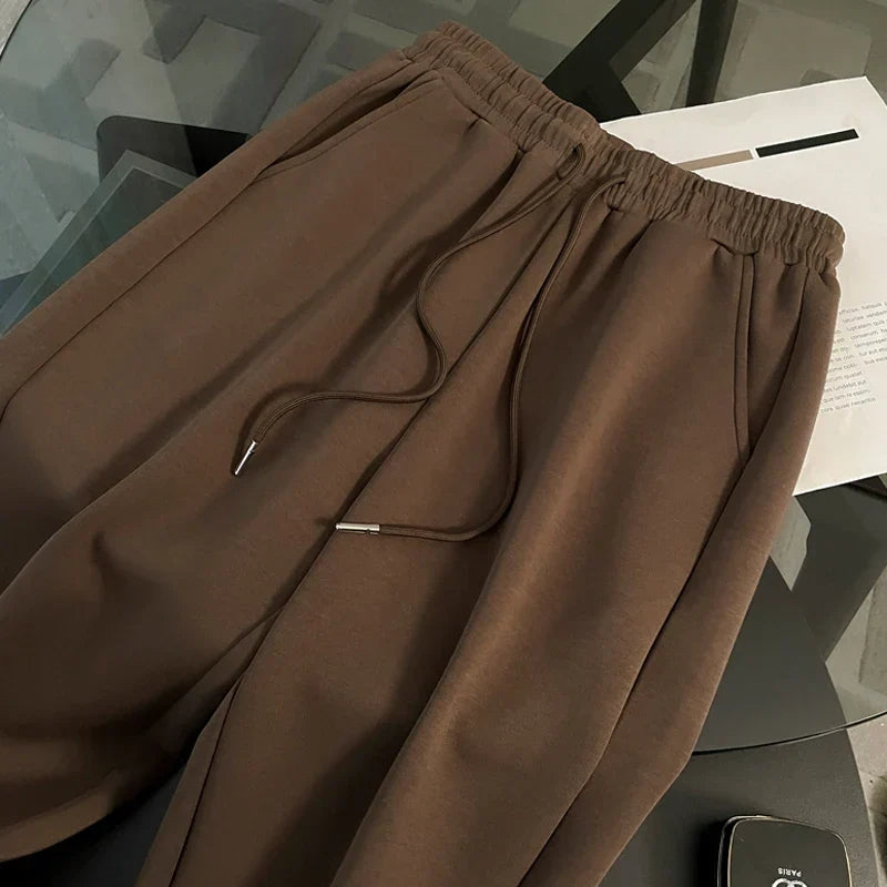 Conjunto Esportivo com Jaqueta Listrada e Calça Pantalona