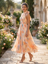 Renata | Vestido Midi Coral Floral com Decote Halter e Saia Plissada