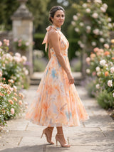 Renata | Vestido Midi Coral Floral com Decote Halter e Saia Plissada