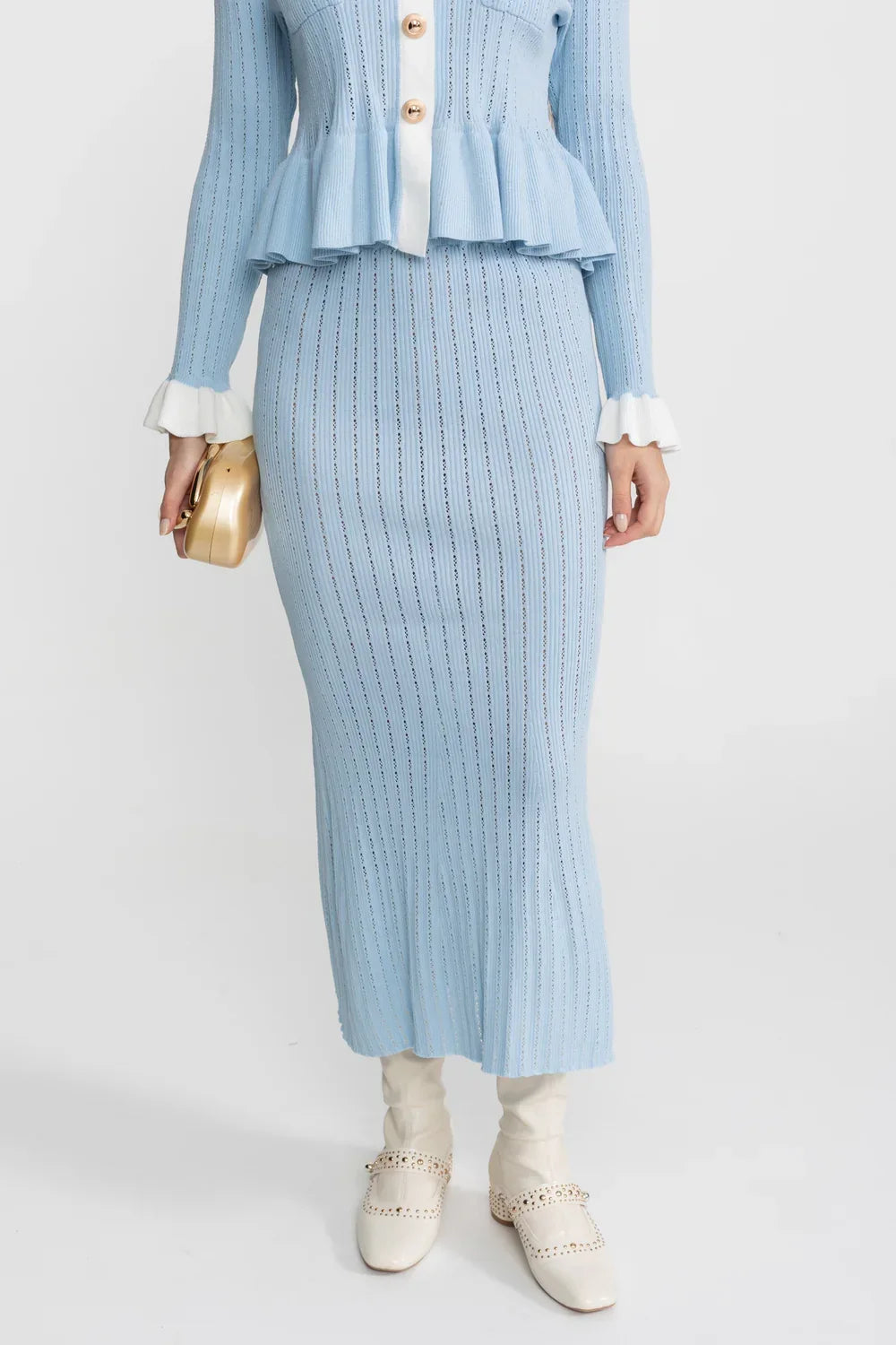 Conjunto Tricô de Duas Peças: Casaco com Peplum e Saia Sereia Midi