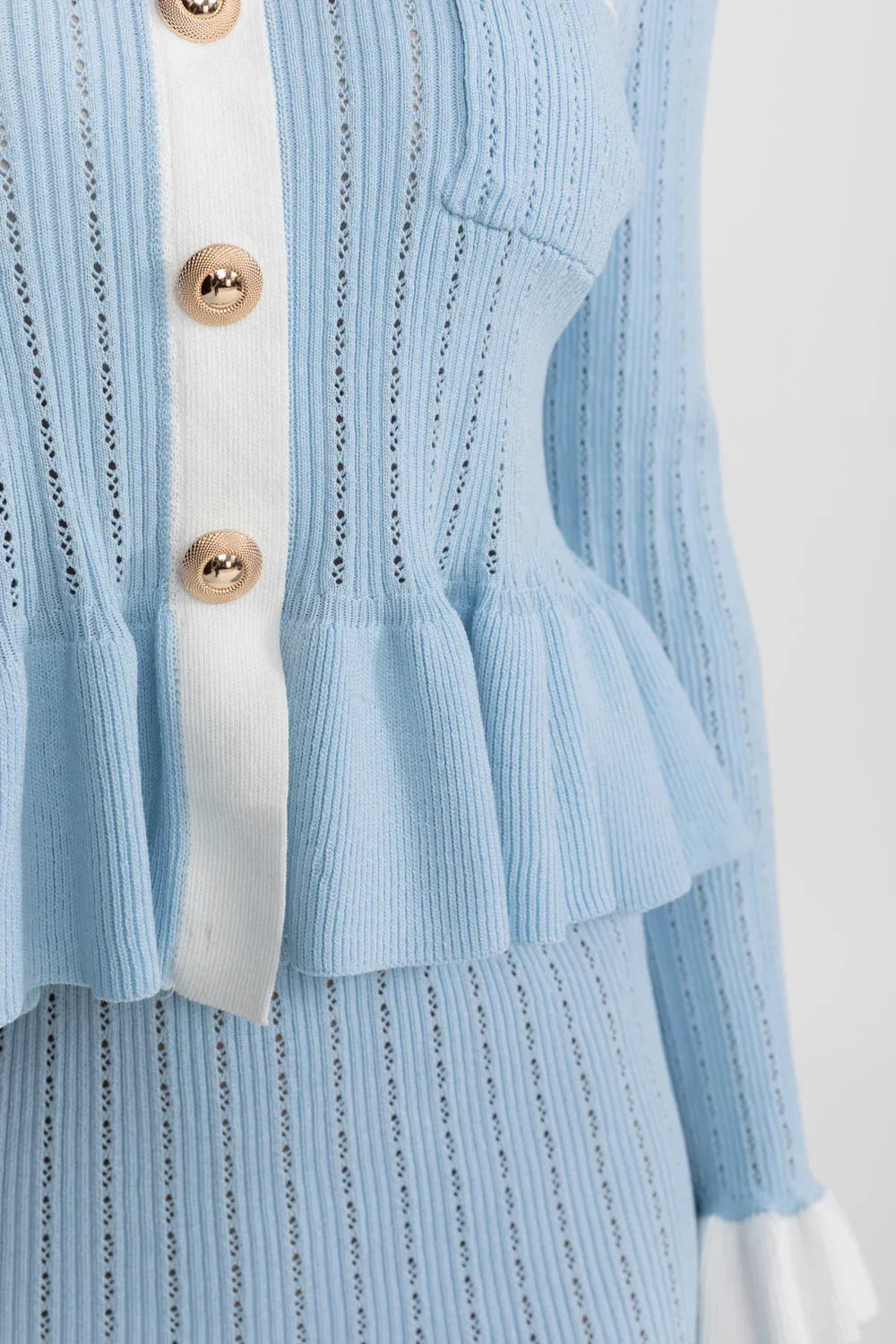 Conjunto Tricô de Duas Peças: Casaco com Peplum e Saia Sereia Midi